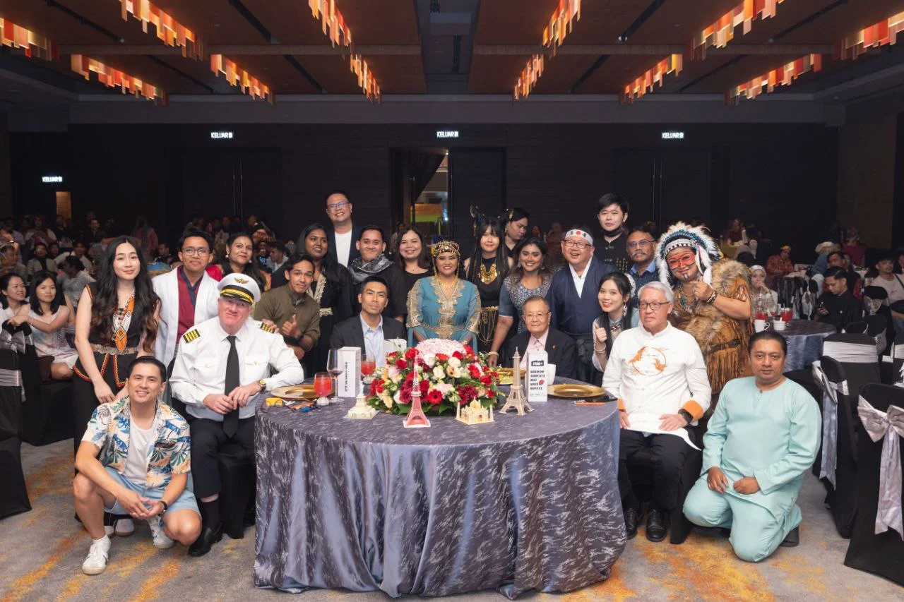 G Hotel associates gather at a table during the Staff Party 2026