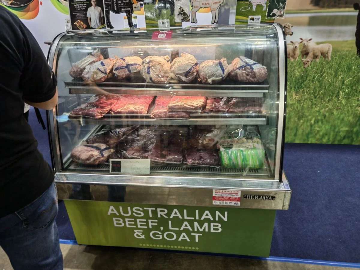 Imported beef, lamb and goat on display at a supplier stand.