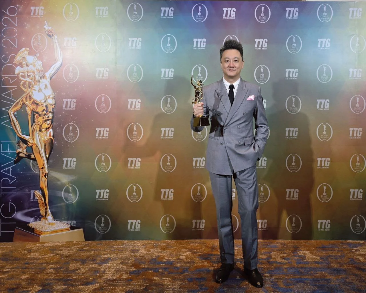 Melvin Ooi, general manager of The Prestige Hotel Penang, holding the Best Hotel in Penang trophy at the 35th Annual TTG Travel Awards